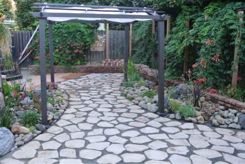 small-water-wise-backyard-with-pergola-and-flagstone-patio-.jpg