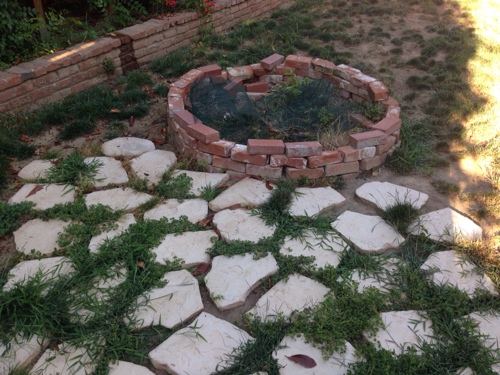 ugly-backyard-before-pic-weeds-brick-and-flagstone.jpg